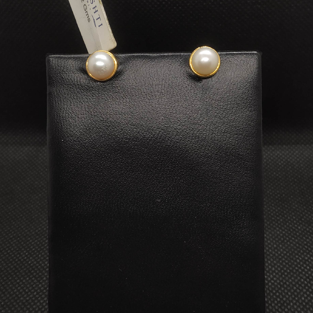 white stone earrings gold